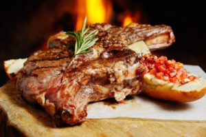 Audley Farm Steak garnished on a cutting block
