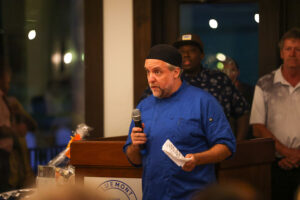 Chef Reid Badger talking to Root to Table's Audience
