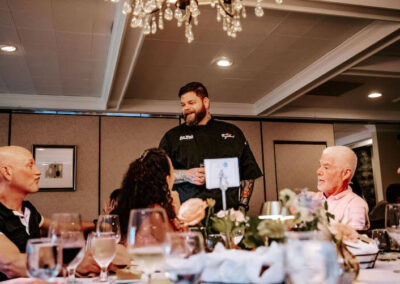 Chef Matt talking to guests at Root to Table's Bavarian Inn 2023 event